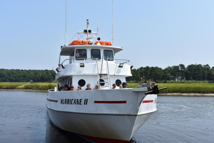 a small boat in a large body of water
