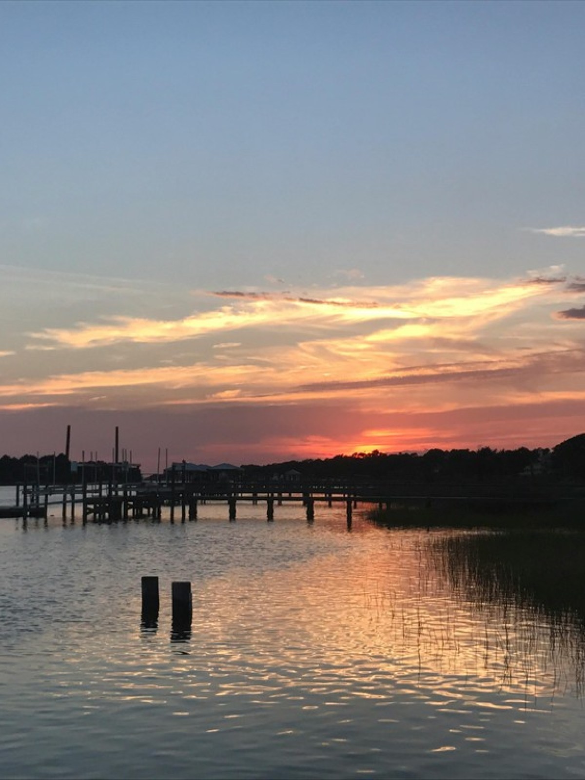 a sunset over a body of water