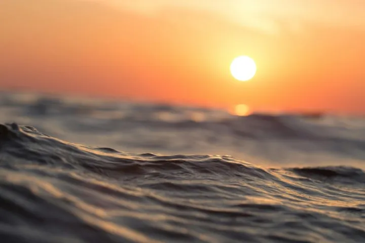 a sunset in the background